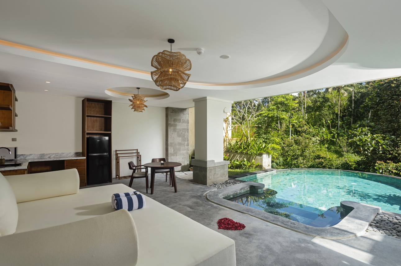 Wide angle premiere private pool villa showing relaxing tropical ambiance in Bali