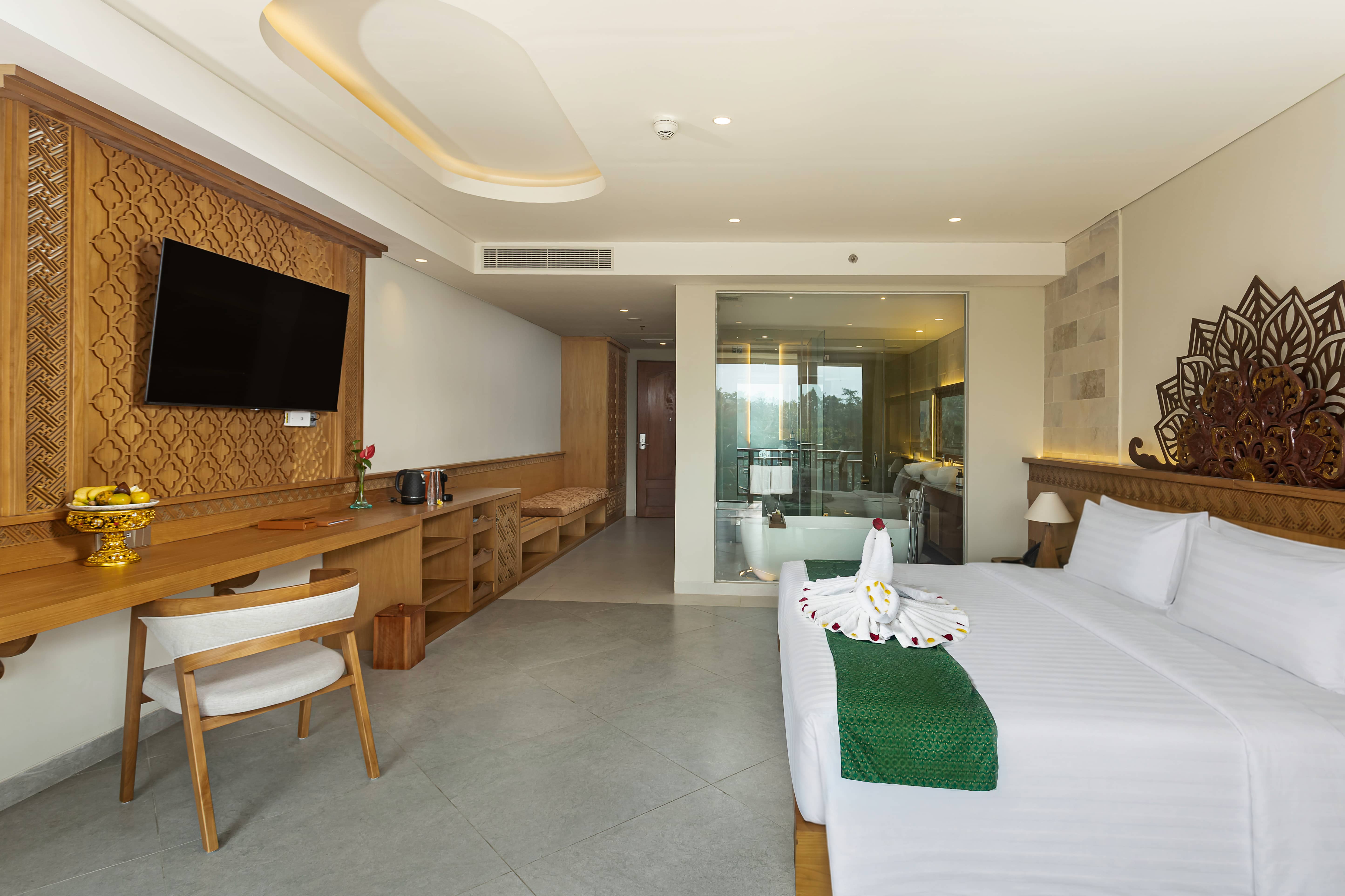 deluxe suite room in Ubud Bali luxury resort with tropical ambiance