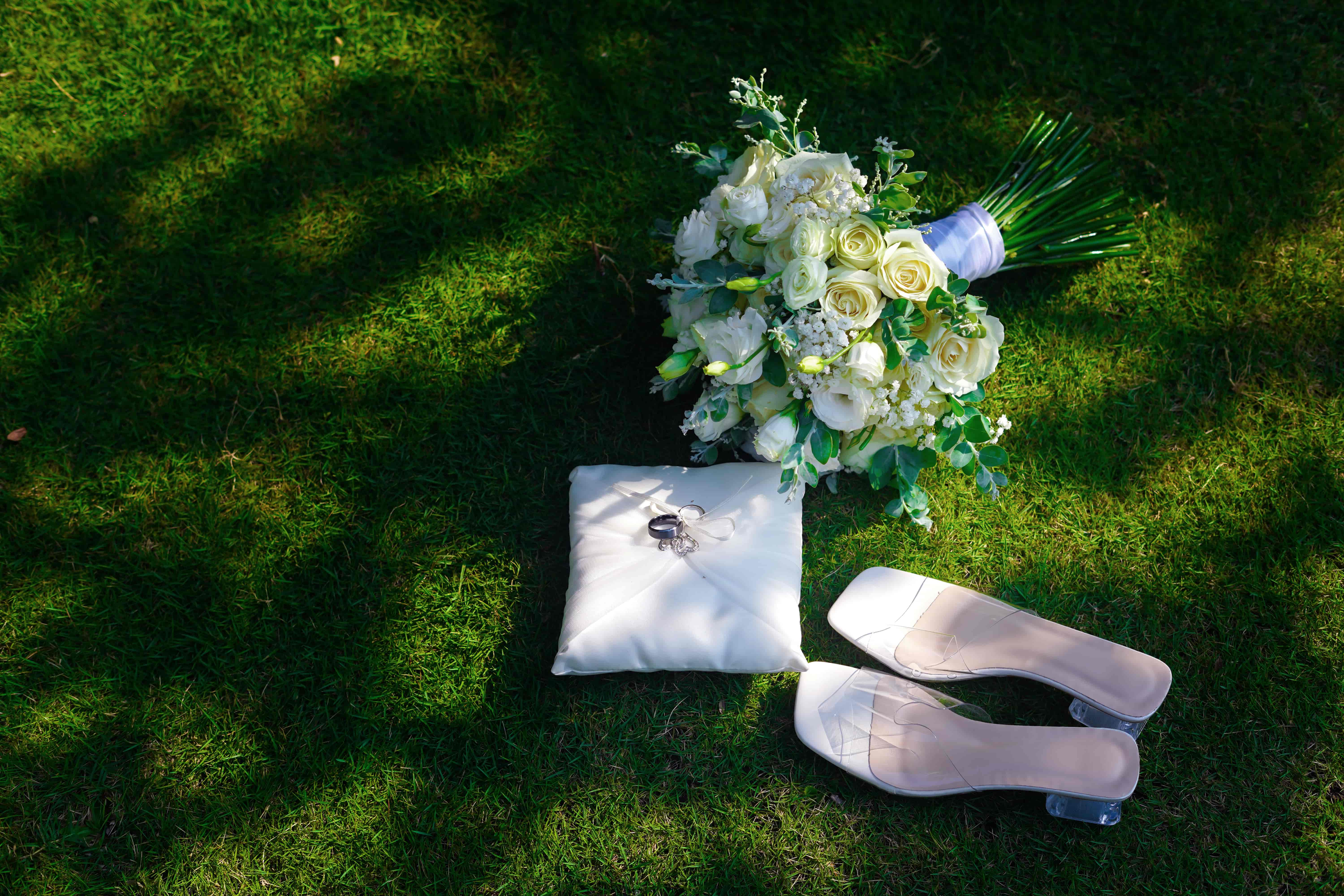 Bride holding a tropical wedding flower bouquet at Sanggraloka Ubud Bali